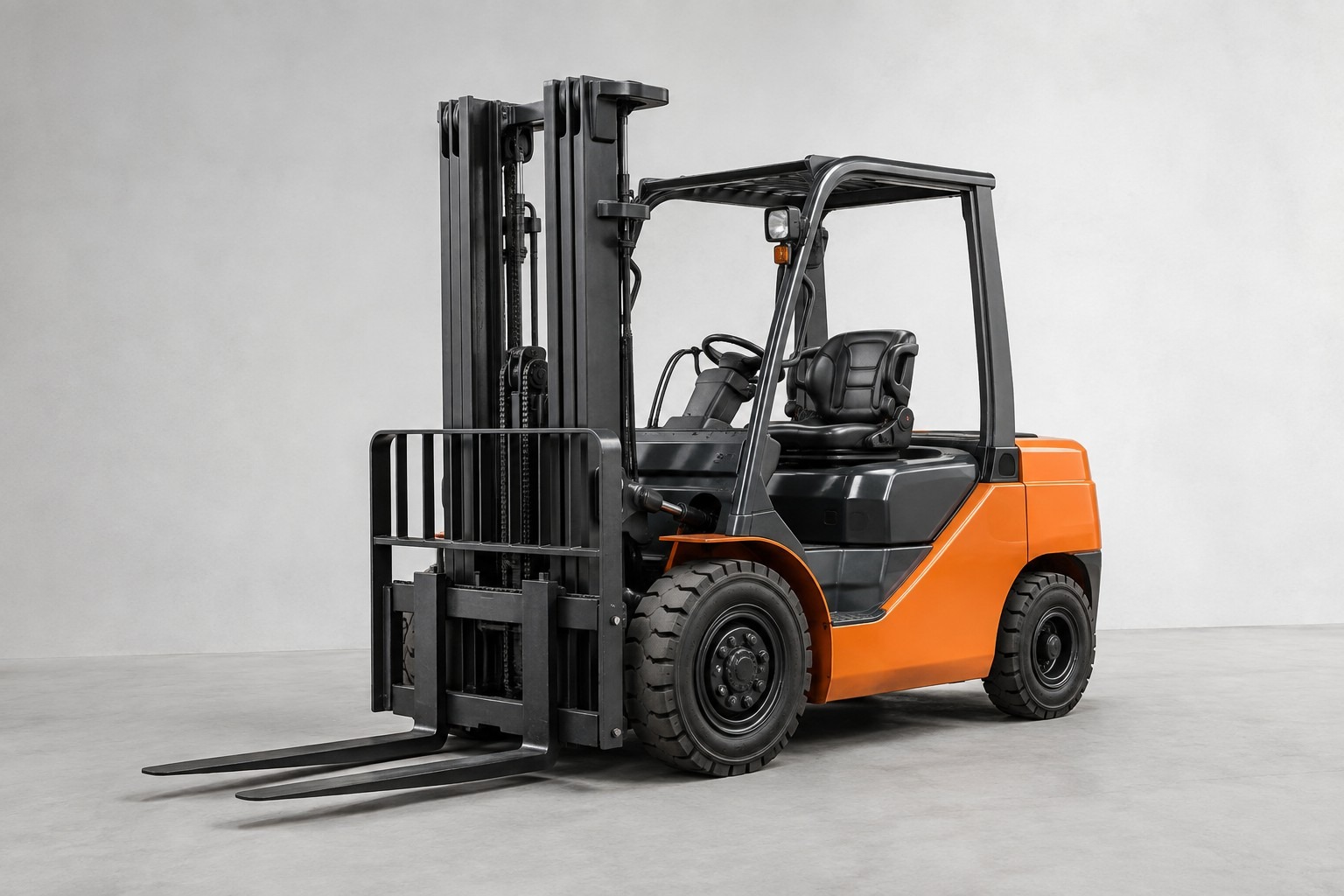 Orange counterbalance forklift with forks lowered